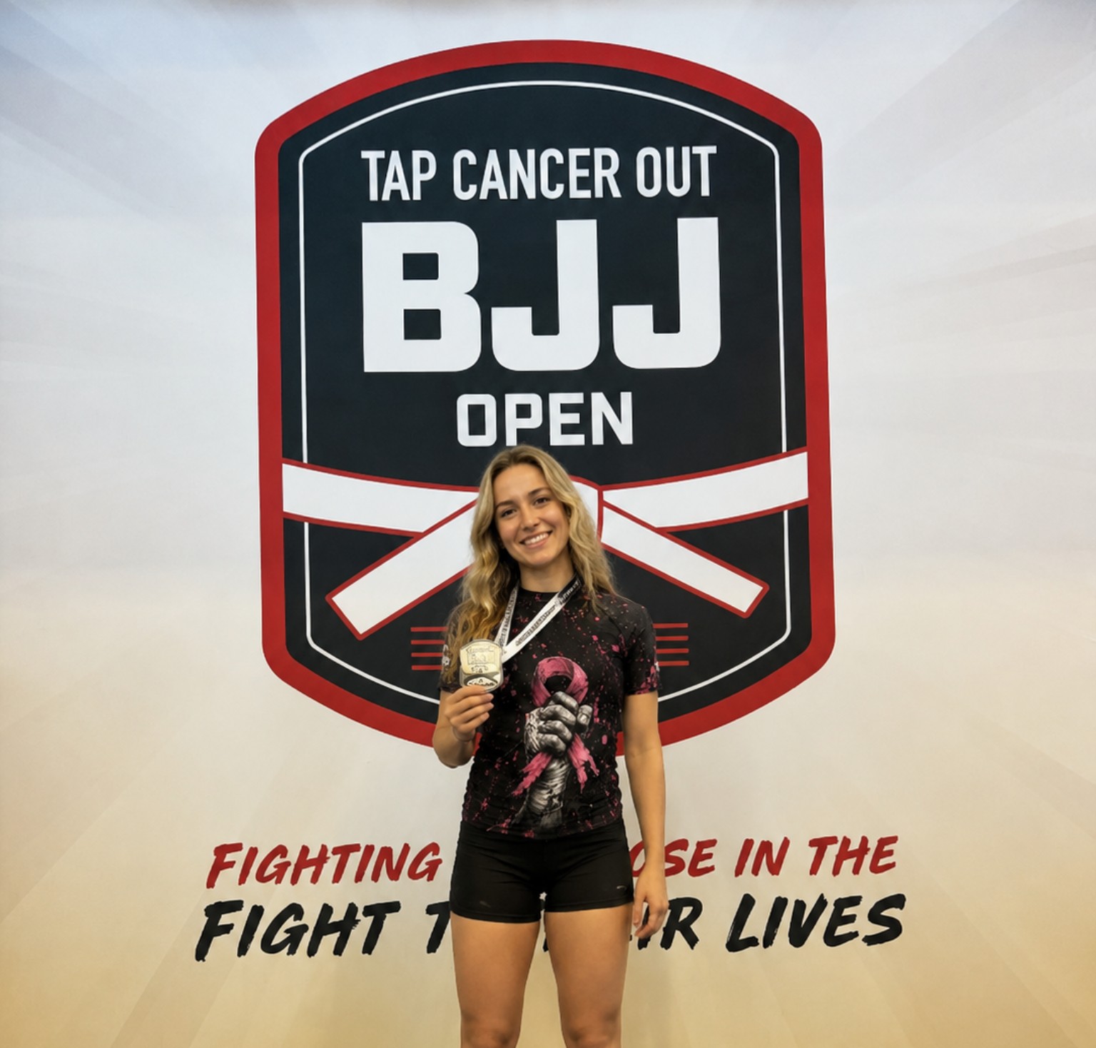 Athlete wearing a custom TapX rashguard